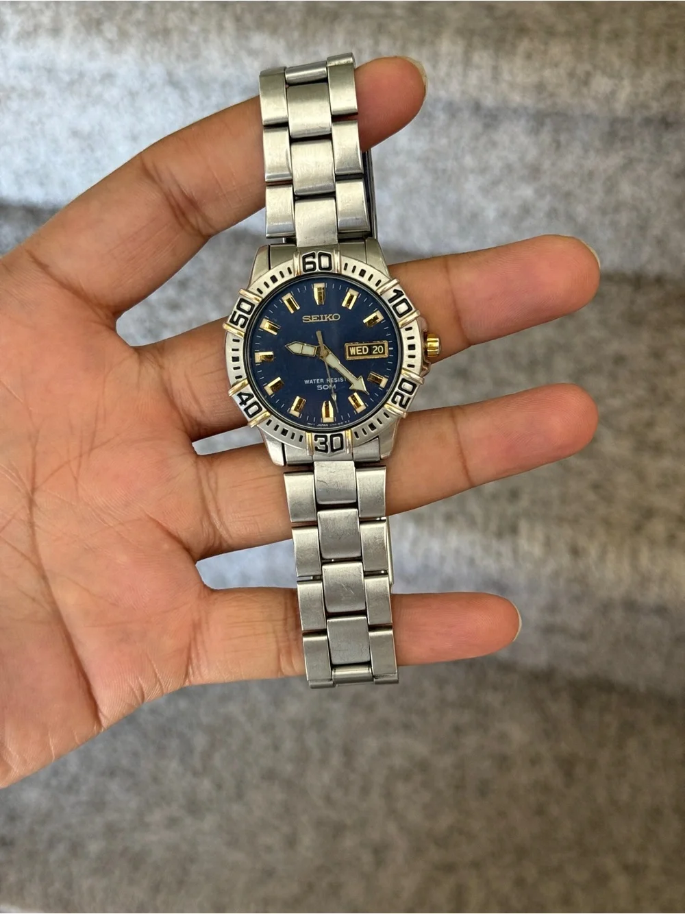 Seiko Blue Dial Stainless Steel Watch with Gold Accents Mens Watch